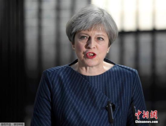 英国首相重申将减少接纳移民 降至每年数万人